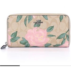 Fun and flowery coach wallet.